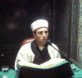 reading Koran in mosque